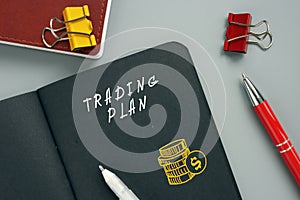 Financial concept meaning TRADING PLAN with sign on the page. AÃÂ trading planÃÂ represents an investor`s personal approach to photo